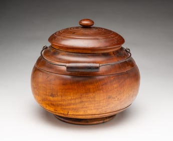LARGE PEASEWARE LIDDED JAR WITH HANDLE.