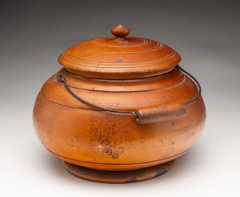 PEASEWARE LIDDED JAR WITH HANDLE.