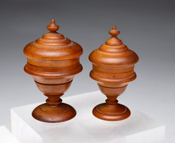 TWO MINIATURE PEASEWARE LIDDED JARS.