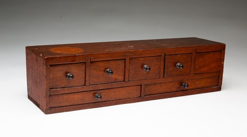 MINIATURE AMERICAN MAHOGANY CASE OF DRAWERS.