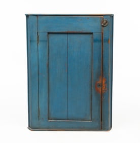 AMERICAN BLUE-PAINTED WALNUT HANGING CORNER CUPBOARD.