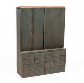 AMERICAN BLUE-GREY PAINTED PINE CHILD'S SIZE APOTHECARY CABINET WITH CUPBOARD TOP.
