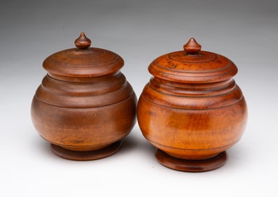 TWO PEASEWARE LIDDED CANISTERS.