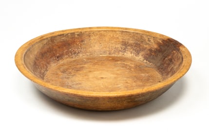 LARGE AMERICAN TURNED WOOD BOWL WITH TRACES OF OLD PAINT.