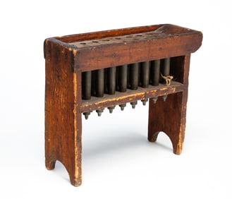 AMERICAN TWENTY-FOUR TUBE PEWTER CANDLE MOLD.