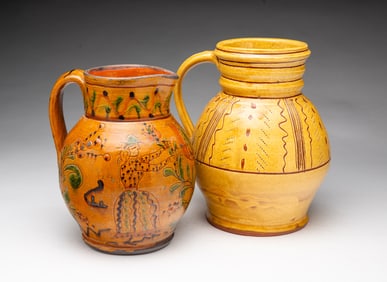 TWO AMERICAN GLAZED REDWARE PITCHERS, INCL. GREG SHOONER (OREGONIA, OHIO).