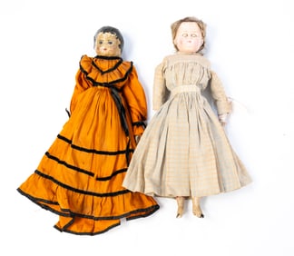 TWO DOLLS, INCL. WAX-HEAD and PAPIER-MACHE EXAMPLES.