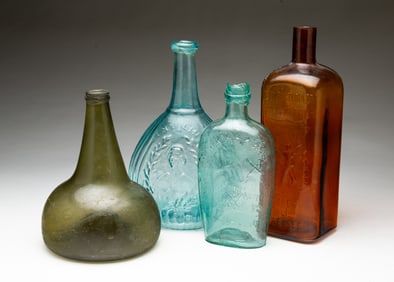 FOUR AMERICAN MOLD-BLOWN GLASS BOTTLES.
