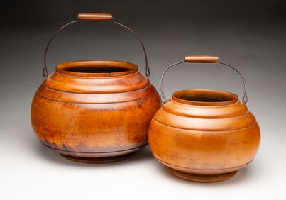 TWO AMERICAN TREENWARE HANDLED CARRIERS.