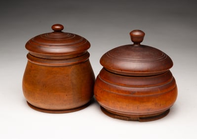 TWO PEASEWARE LIDDED CANISTERS.