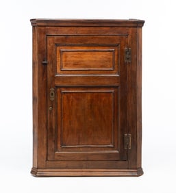 AMERICAN OAK HANGING CORNER CUPBOARD.
