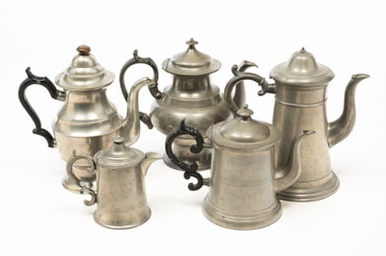 FIVE AMERICAN PEWTER COFFEE AND TEA POTS.