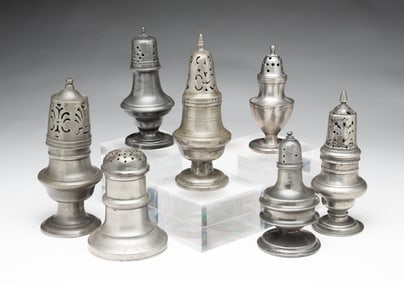 SEVEN AMERICAN PEWTER PEPPER POTS.