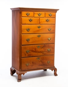 AMERICAN CHIPPENDALE WALNUT NINE-DRAWER TALL CHEST.