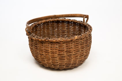 LARGE AMERICAN SPLINT-WOVEN SWING-HANDLED BASKET.