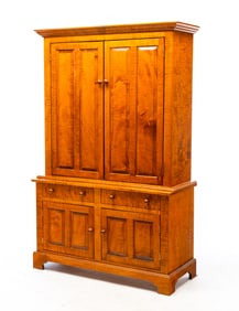 ELDRED WHEELER (HANOVER, MASSACHUSETTS) TIGER MAPLE STEPBACK CUPBOARD.