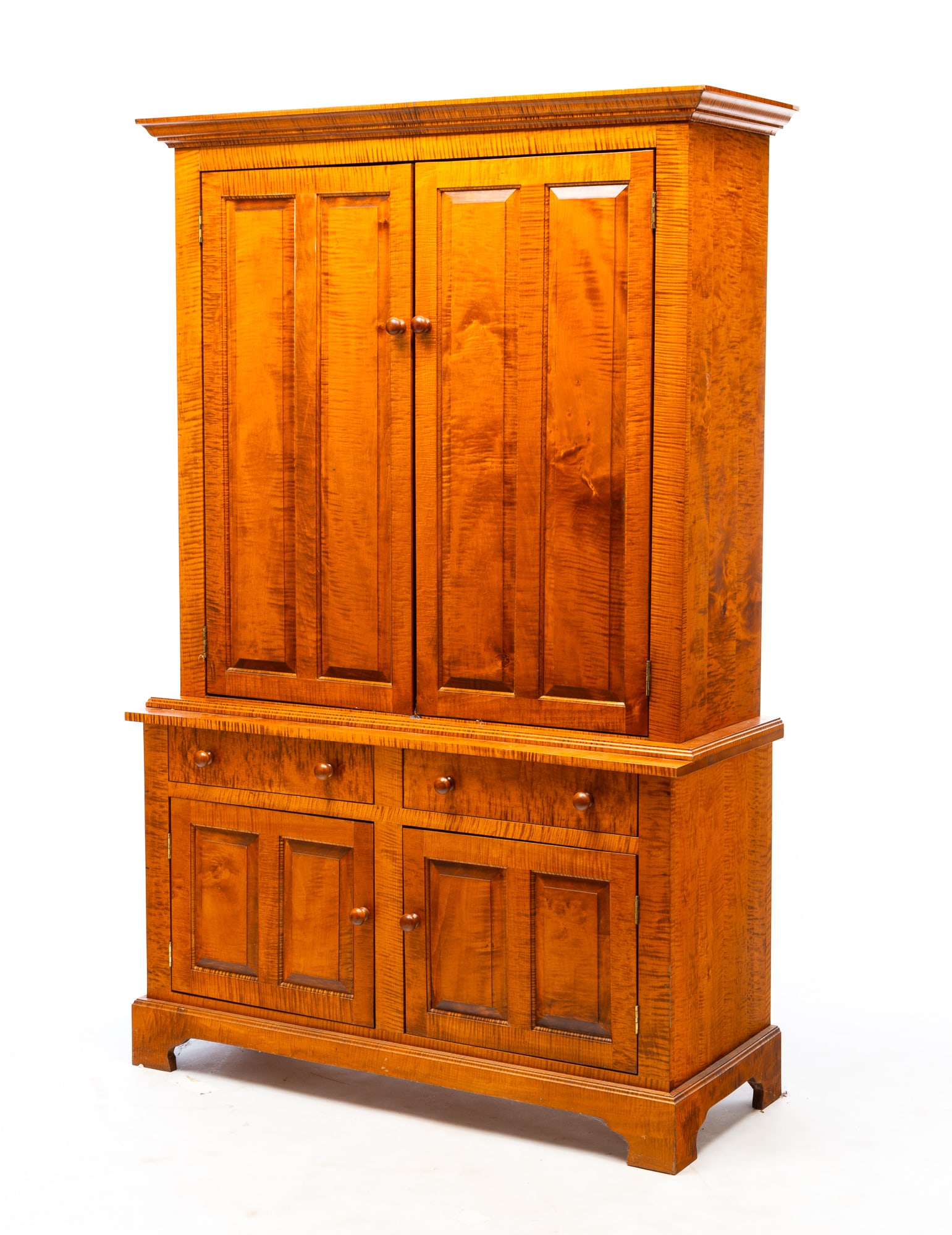 ELDRED WHEELER (HANOVER, MASSACHUSETTS) TIGER MAPLE STEPBACK CUPBOARD. (1 of 5)