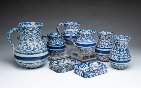 EIGHT AMERICAN BLUE-SPONGED STONEWARE ITEMS.