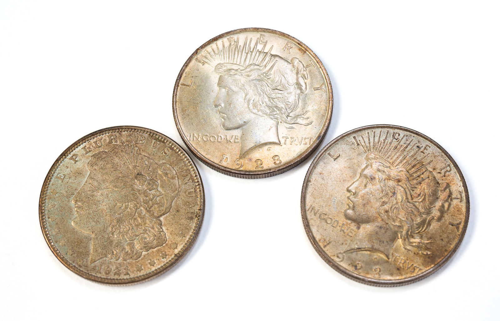 THREE AMERICAN SILVER DOLLARS. (1 of 2)
