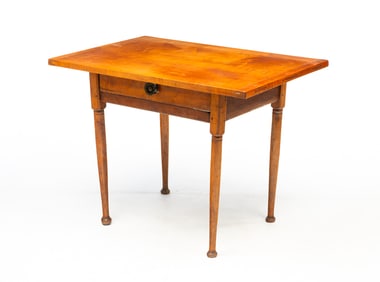 AMERICAN FIGURED MAPLE ONE-DRAWER TAVERN TABLE.