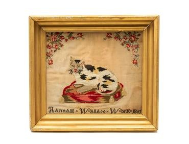 HANNAH WALLACE NEEDLEWORK OF RECUMBENT CAT, DATED 1861.