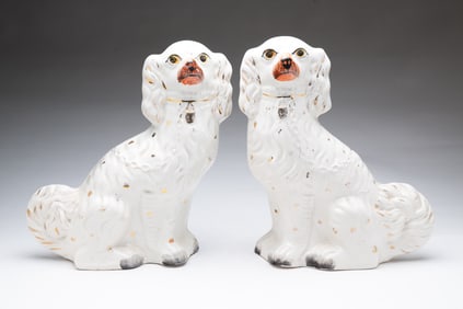 PAIR OF STAFFORDSHIRE PORCELAIN SPANIELS.