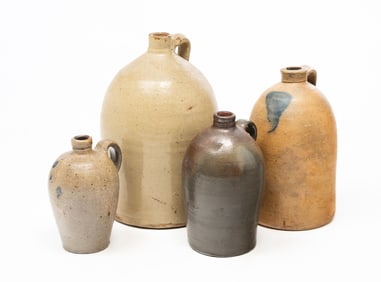 FOUR AMERICAN STONEWARE JUGS.