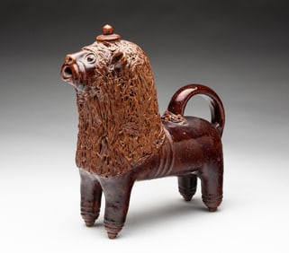 AMERICAN GLAZED REDWARE LION PITCHER.