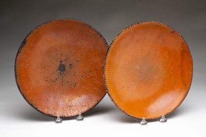 TWO AMERICAN GLAZED REDWARE PLATES.