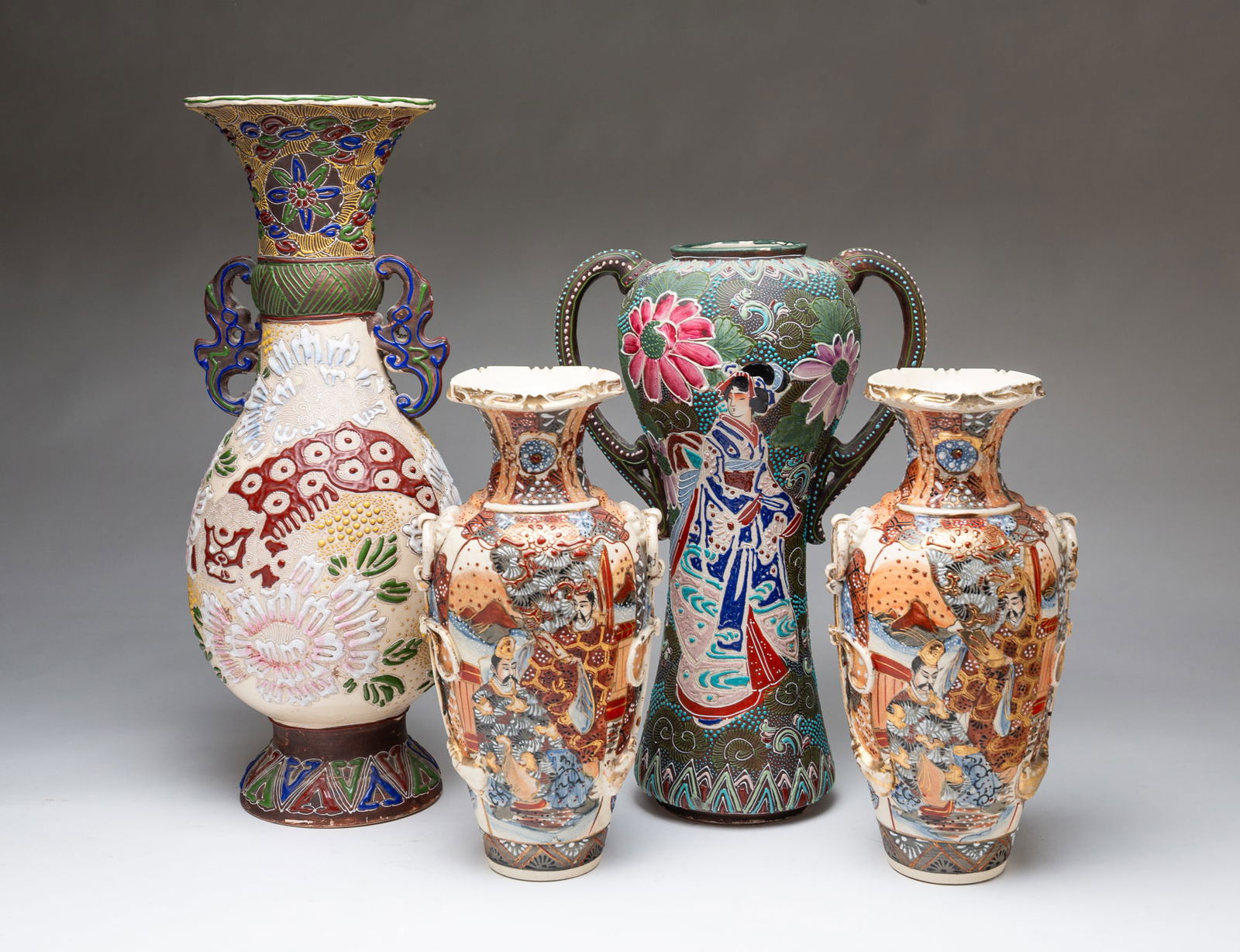 FOUR JAPANESE DECORATED POTTERY VASES. (1 of 8)