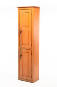 AMERICAN PUMPKIN-PAINTED POPLAR CHIMNEY CUPBOARD.