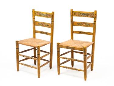 PAIR OF EUROPEAN POLYCHROME-DECORATED LADDERBACK SIDE CHAIRS.
