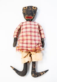 AMERICAN FOLK ART OIL CLOTH DOLL.