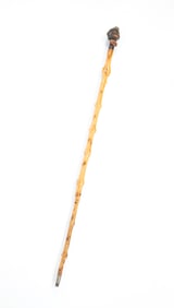 AMERICAN FOLK ART CARVED FIGURAL WALKING STICK.