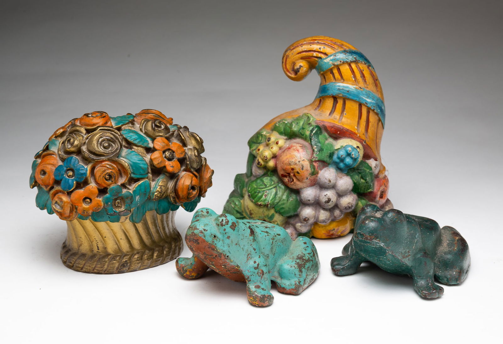 FOUR AMERICAN PAINTED DOORSTOPS. (1 of 5)