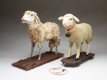 TWO SHEEP PULL TOYS.