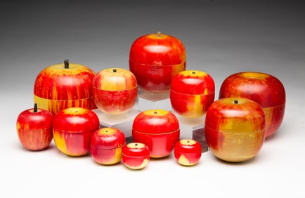 COLLECTION OF TWELVE JAPANESE APPLE CONTAINERS AND GAMES.