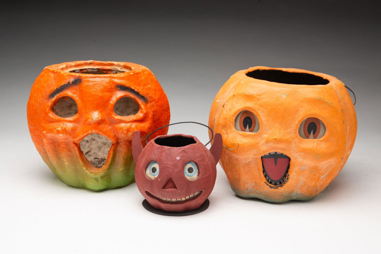 THREE GERMAN PAINTED PAPER PULP HALLOWEEN JACK-O-LANTERNS. (1 of 5)