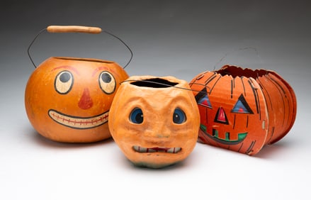 THREE PAINTED HALLOWEEN JACK-O-LANTERNS.