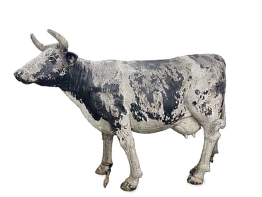 LARGE MOLDED FIBERGLASS FULL-BODIED HOLSTEIN COW YARD SCULPTURE.