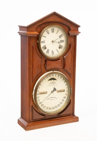 ITHACA CALENDAR CLOCK CO. (ITHACA, NEW YORK) WALNUT DOUBLE-DIAL MANTEL CLOCK.