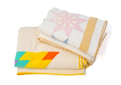 TWO AMERICAN COTTON STAR-PATTERNED QUILTS.