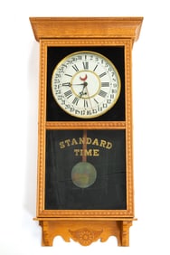 WILLIAM L. GILBERT CLOCK CO. (WINSTED, CONNECTICUT) "WASHINGTON" OAK CALENDAR WALL CLOCK.