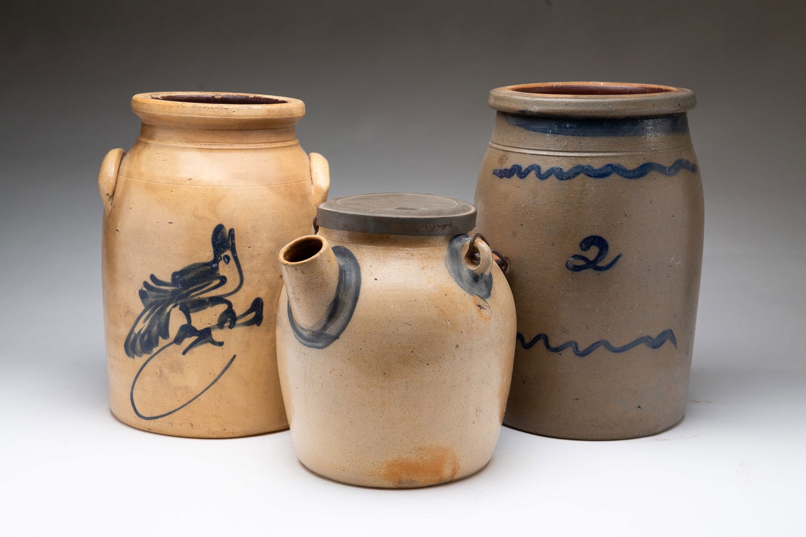 THREE AMERICAN COBALT-DECORATED STONEWARE VESSELS, INCL. BATTER JUG. (1 of 5)