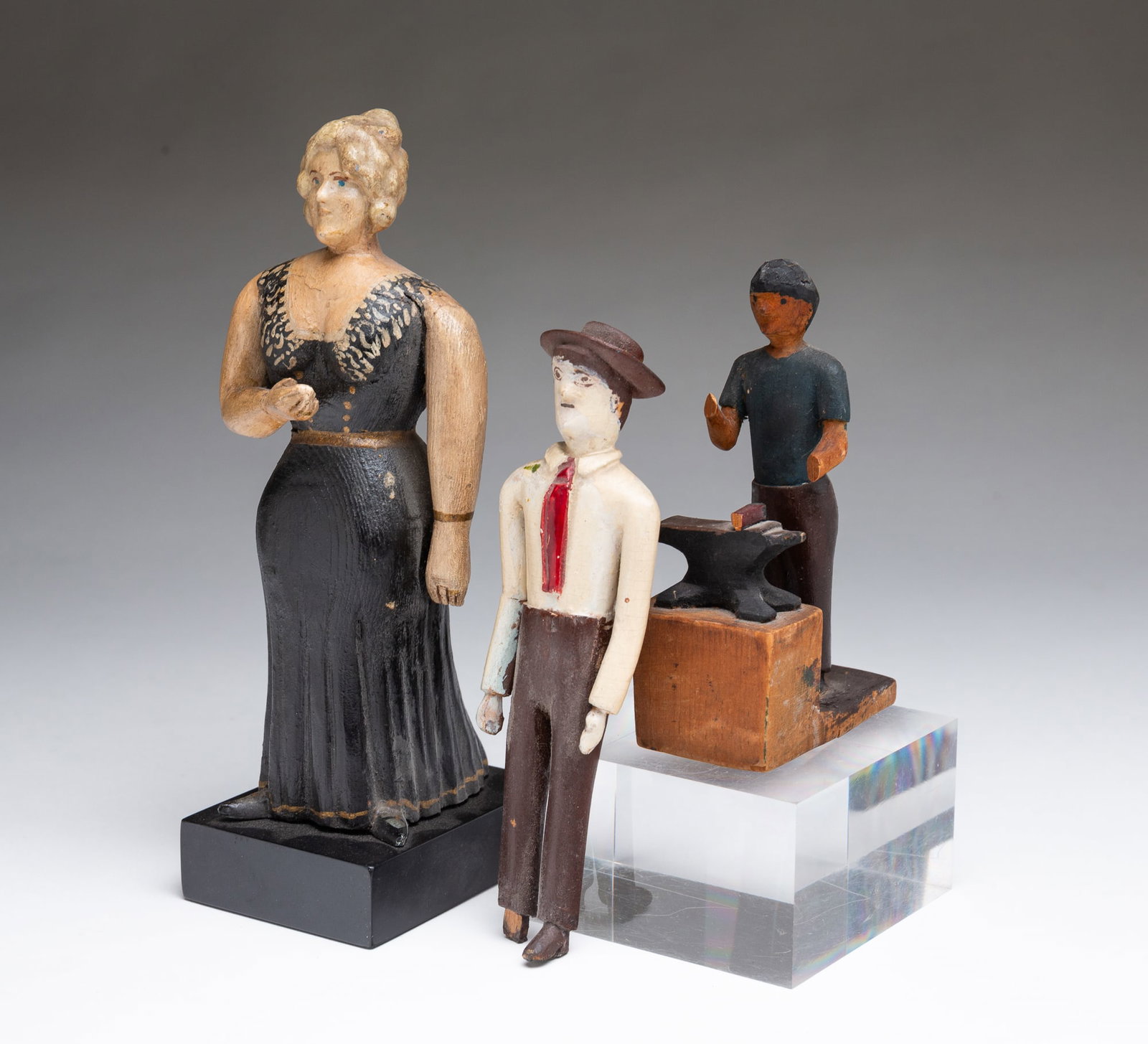 THREE AMERICAN FOLK ART CARVED FIGURES. (1 of 5)