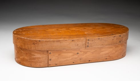 AMERICAN BENTWOOD AND COPPER-TACKED OVAL BOX.