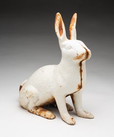AMERICAN WHITE-PAINTED AND CAST IRON RABBIT GARDEN ORNAMENT.