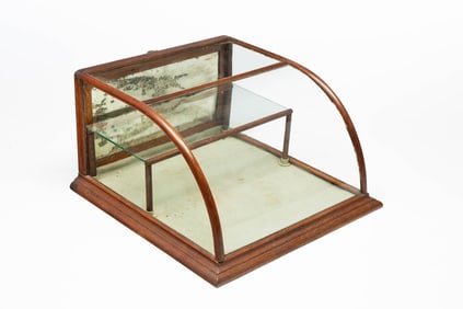 AMERICAN OAK AND CURVED GLASS GENERAL STORE COUNTERTOP DISPLAY CASE.