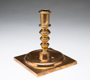 EUROPEAN CAST BRASS CANDLESTICK.