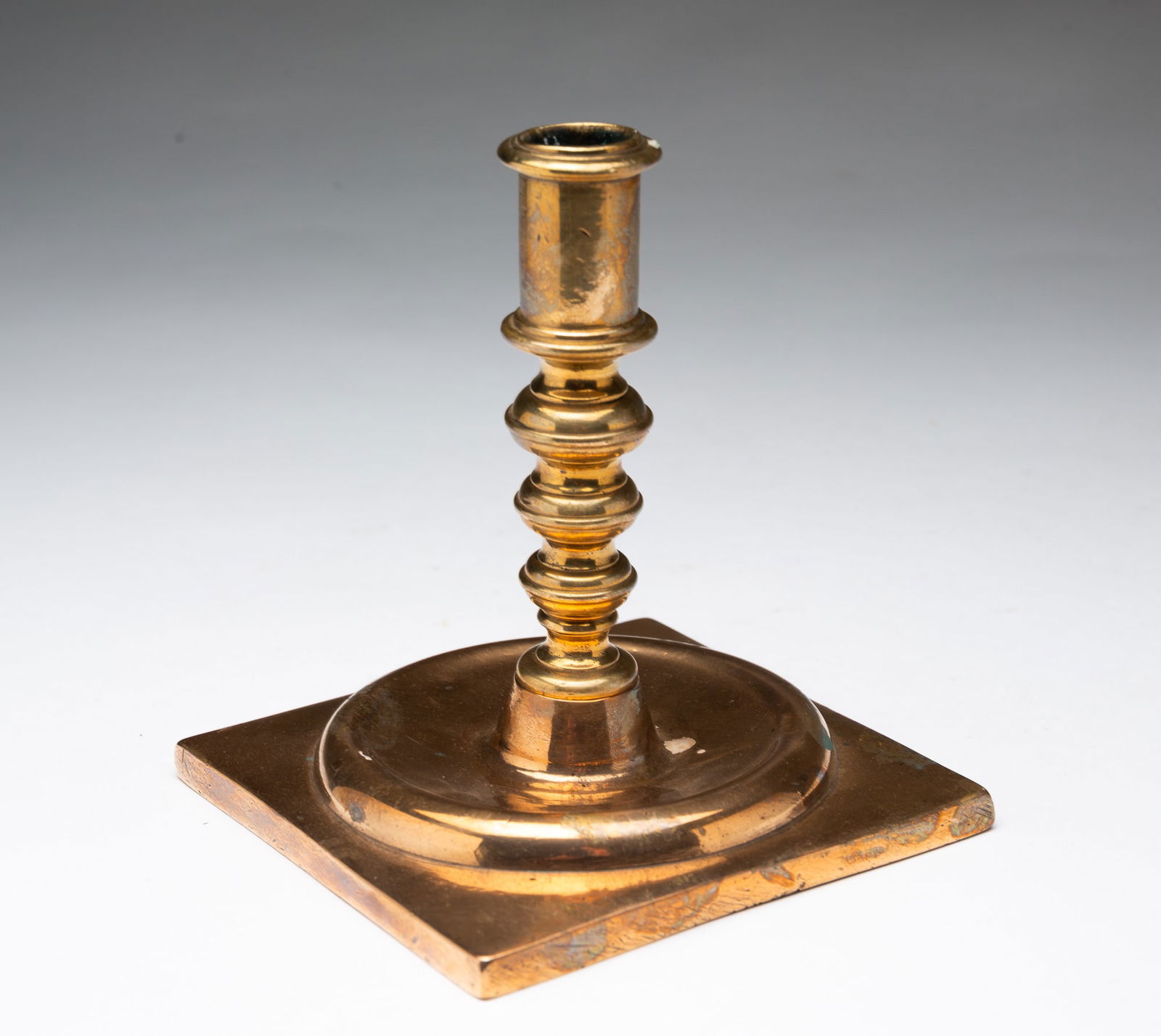 EUROPEAN CAST BRASS CANDLESTICK. (1 of 4)